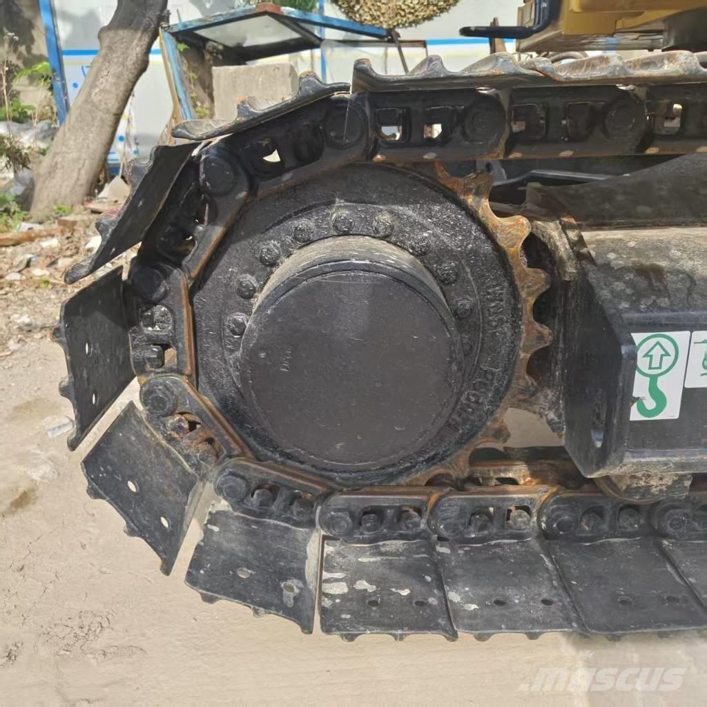 CAT 310 Roomikekskavaatorid