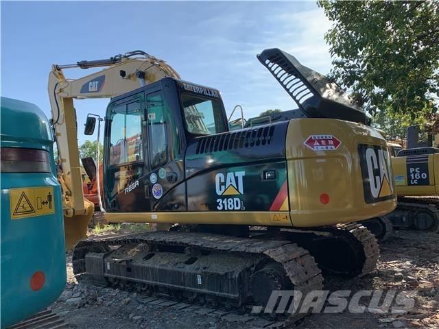 CAT 318DL Roomikekskavaatorid