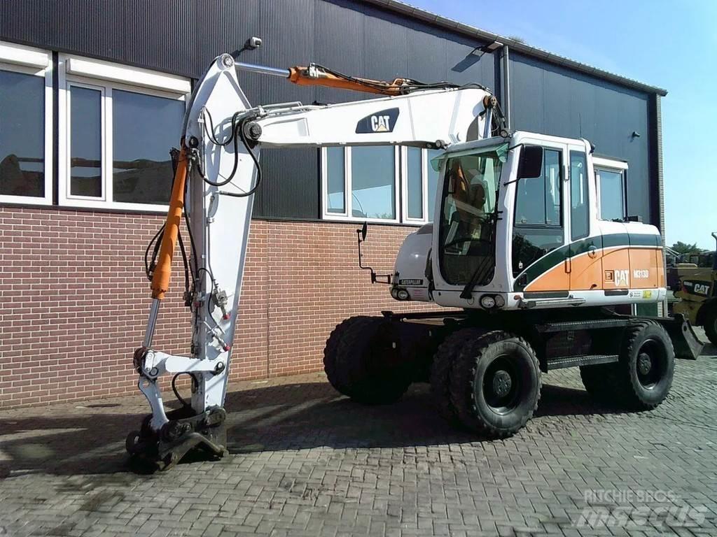 CAT M313D Ratasekskavaatorid