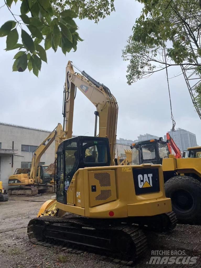 CAT 310 Roomikekskavaatorid