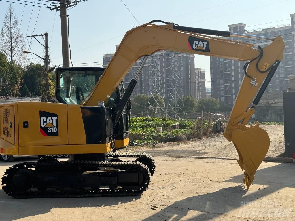 CAT 310 Roomikekskavaatorid