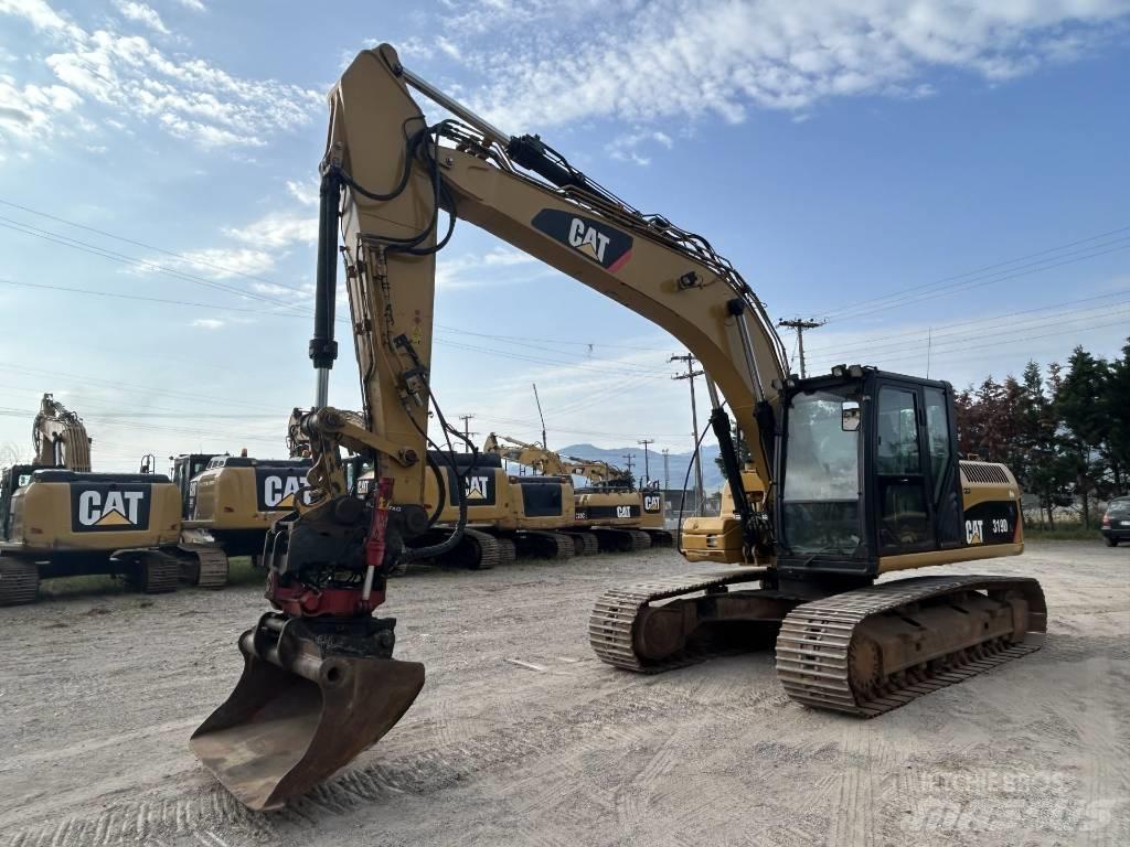 CAT 319 D L Roomikekskavaatorid