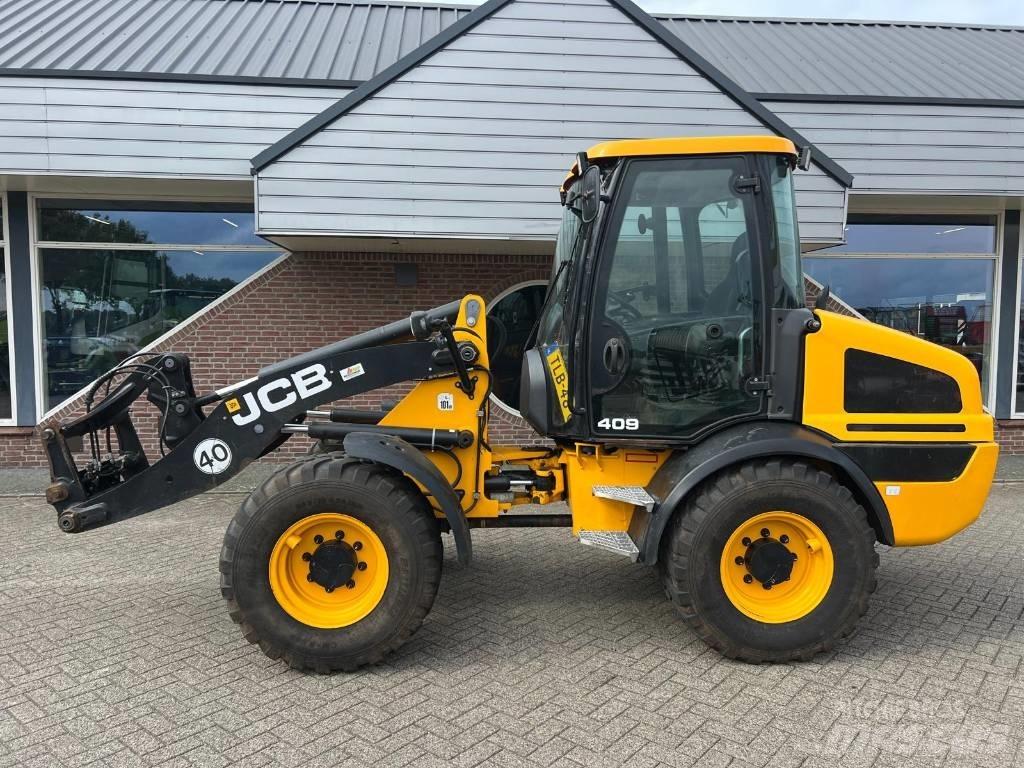 JCB 409 Agri shovel Rataslaadurid