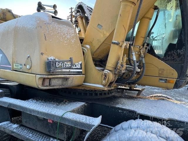 CAT M 322 C MH Ratasekskavaatorid
