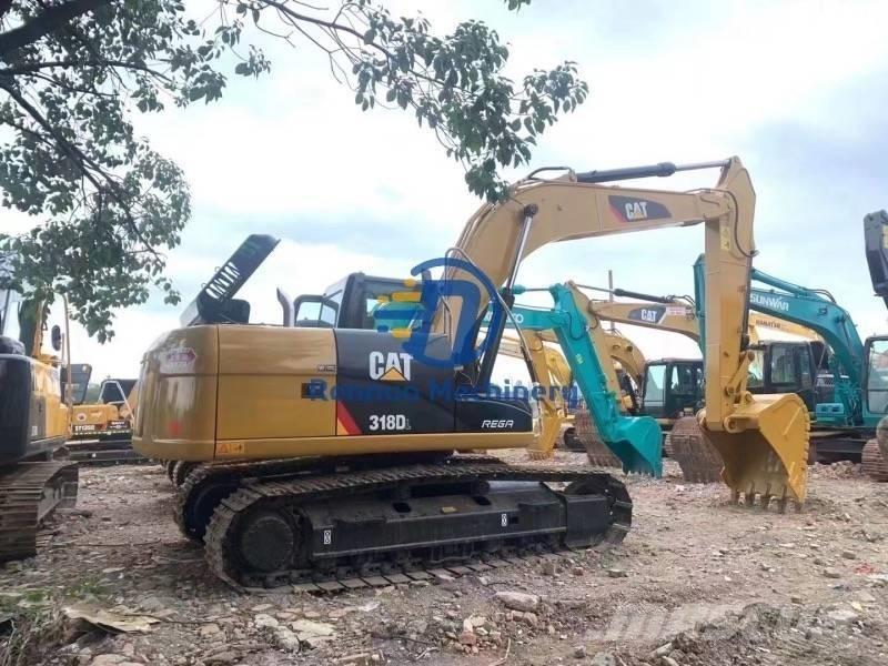 CAT 318DL Roomikekskavaatorid