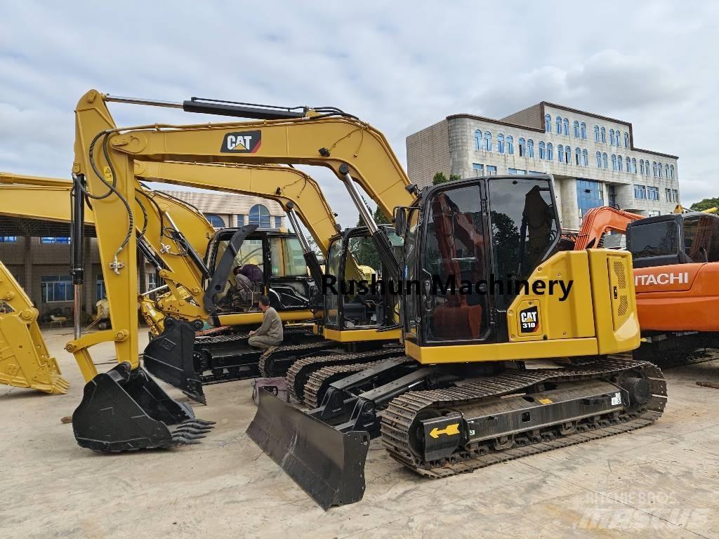 CAT 310 Roomikekskavaatorid