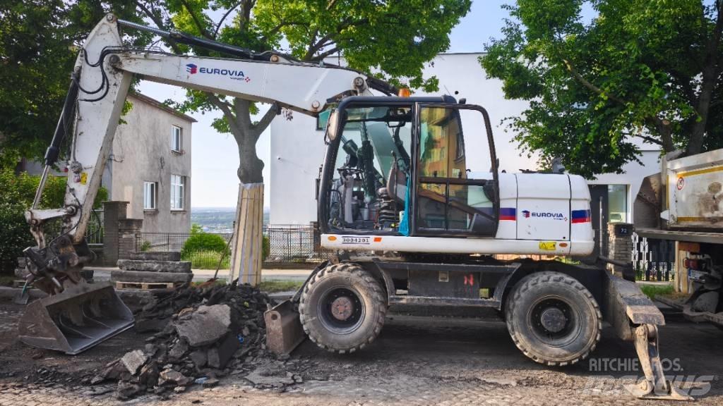 CAT 313 D Ratasekskavaatorid