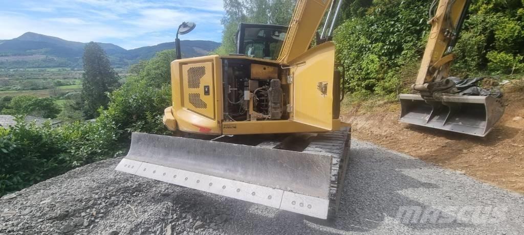 CAT 310 Roomikekskavaatorid