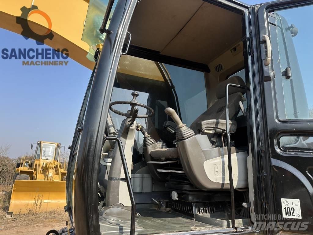 CAT M320D Ratasekskavaatorid