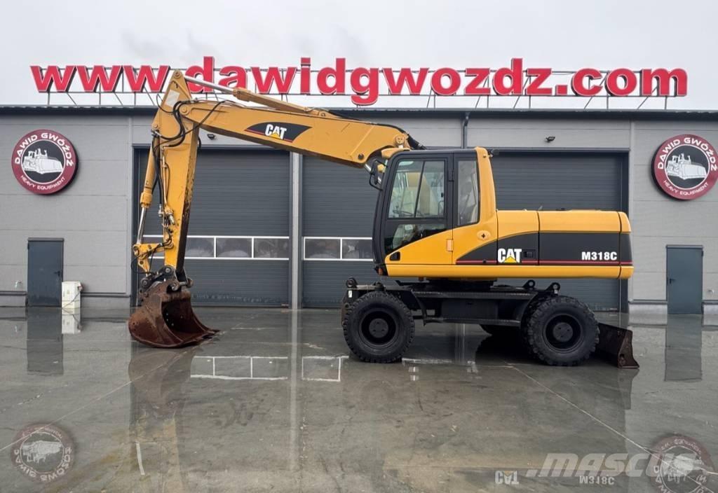 CAT M 318 C Ratasekskavaatorid