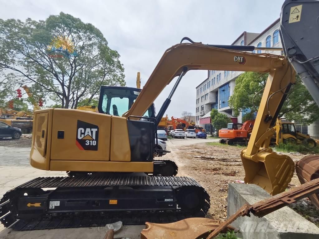 CAT 310 Roomikekskavaatorid