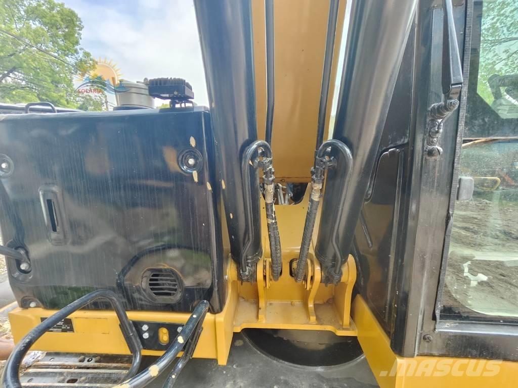 CAT 310 Roomikekskavaatorid