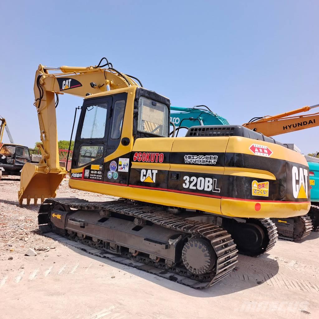 CAT 320 B L Roomikekskavaatorid