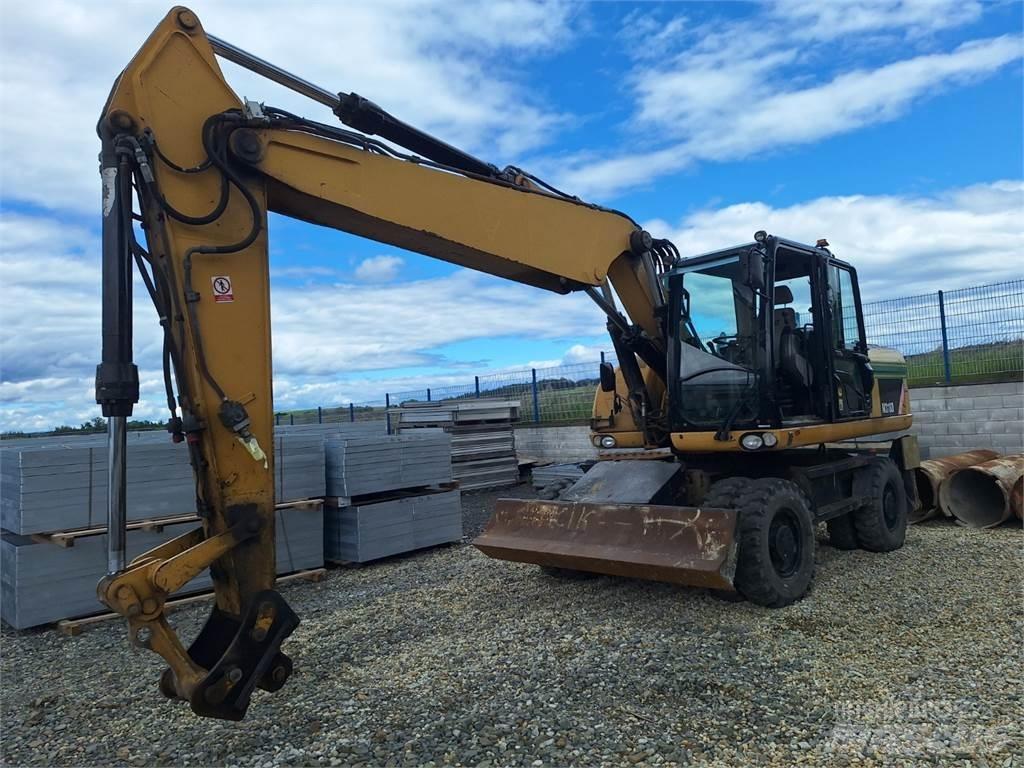 CAT M318D 4X4 Muu