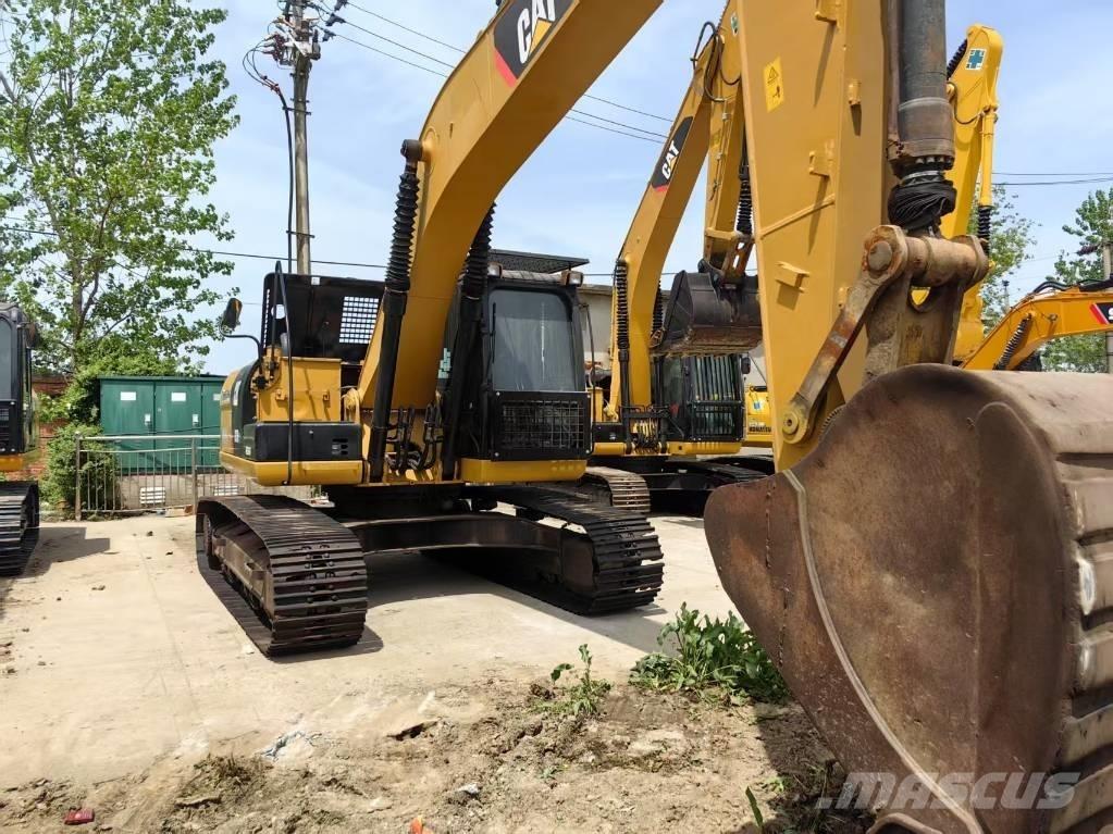 CAT 323 D Roomikekskavaatorid