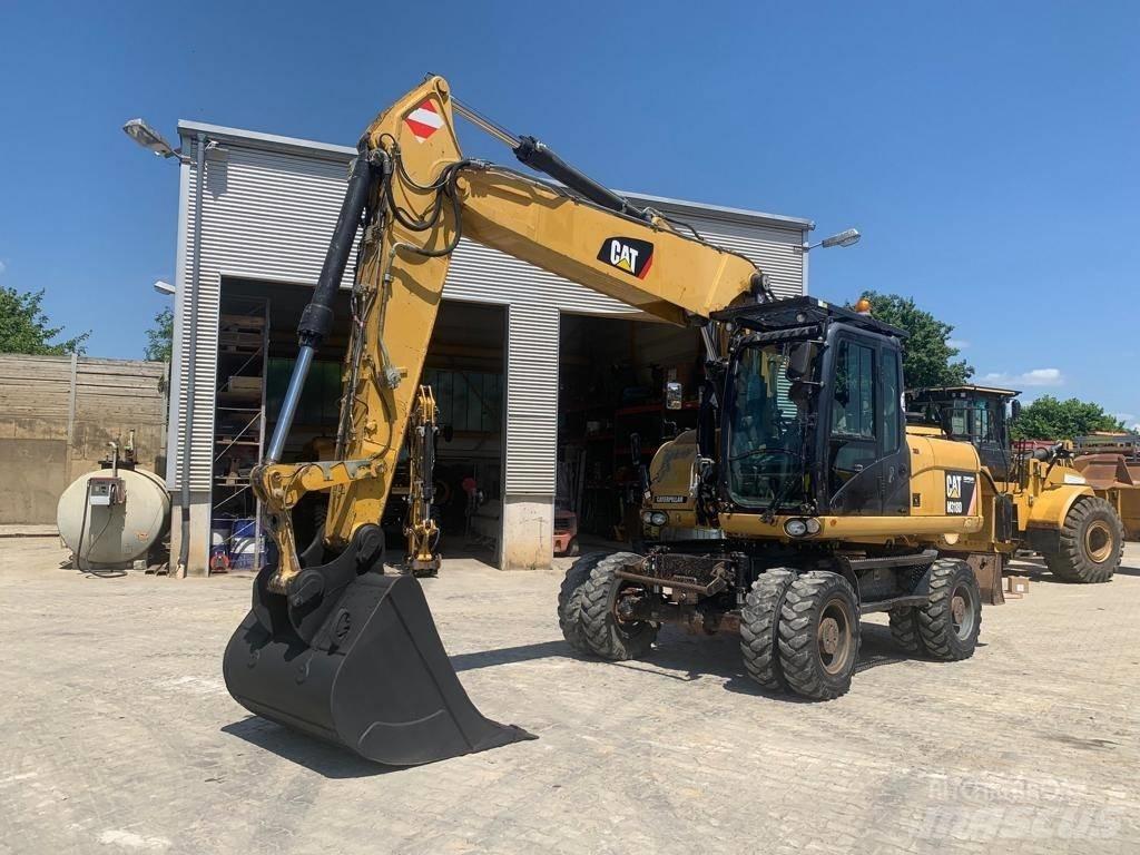 CAT M 318 D Ratasekskavaatorid