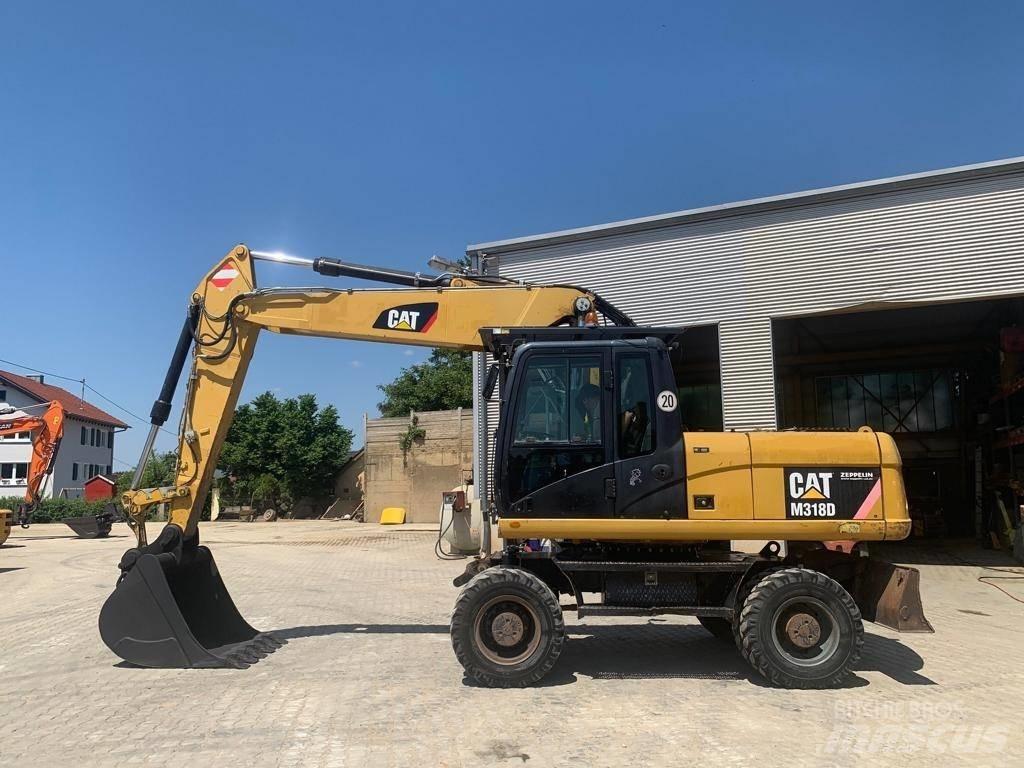 CAT M 318 D Ratasekskavaatorid