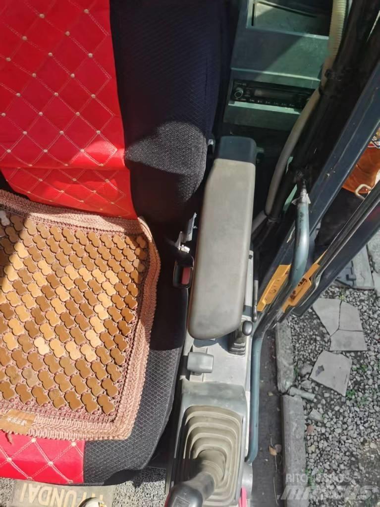 Hyundai 210w-9 Ratasekskavaatorid