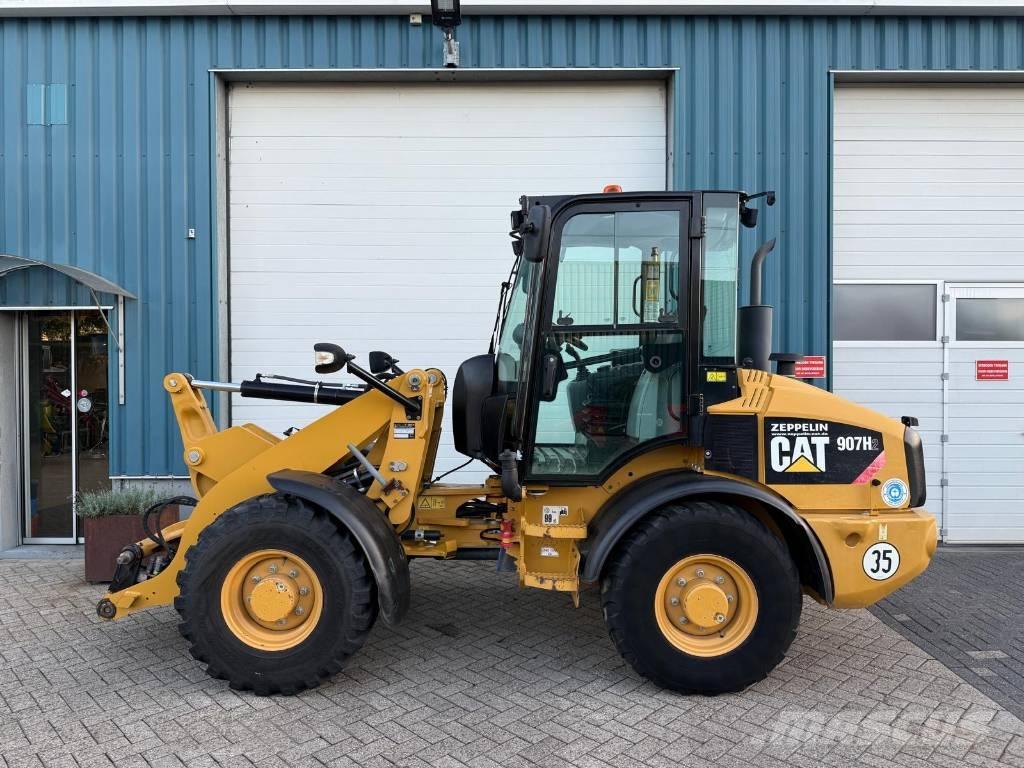 CAT 907 H Rataslaadurid
