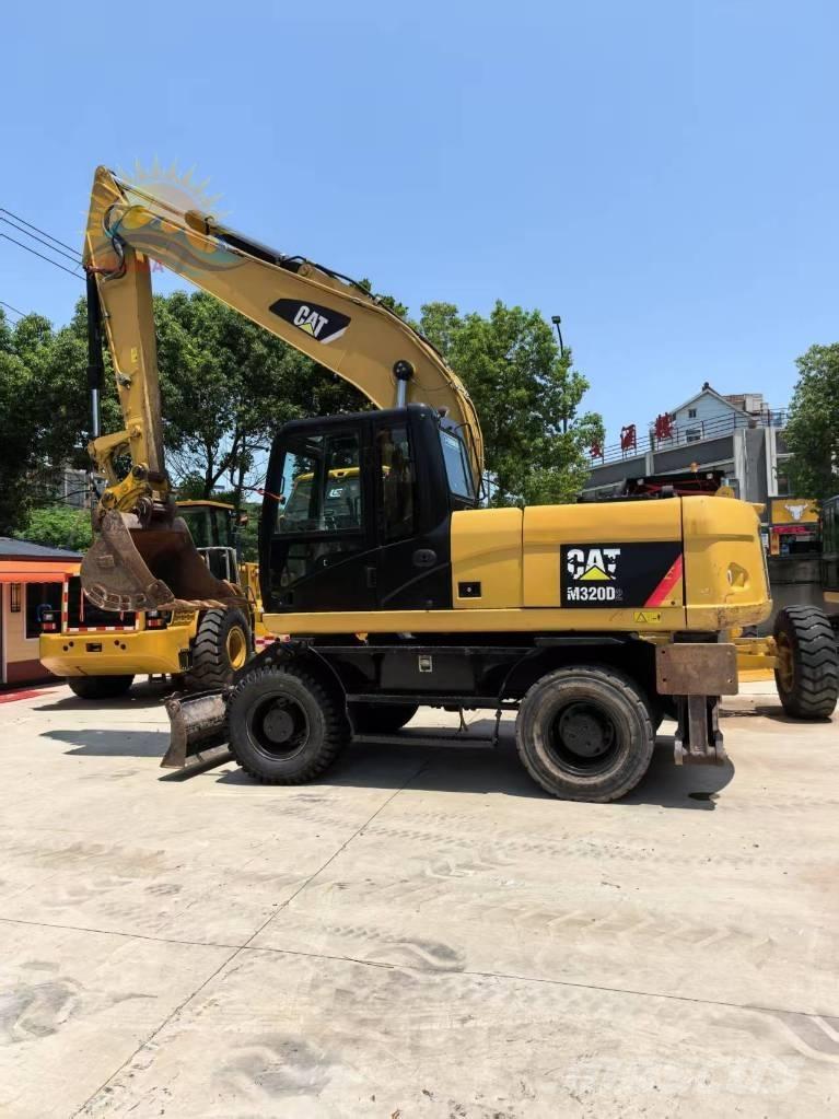 CAT M 320D2 Ratasekskavaatorid