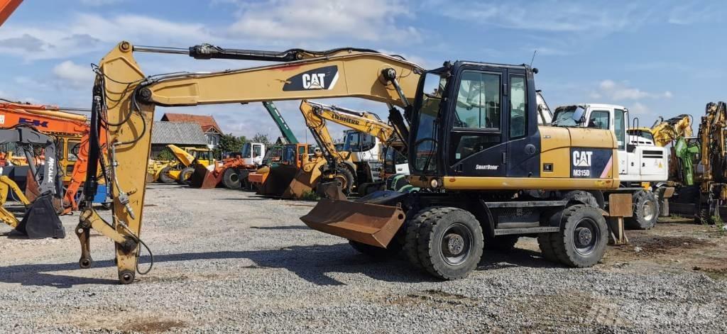 CAT M 315 D Ratasekskavaatorid