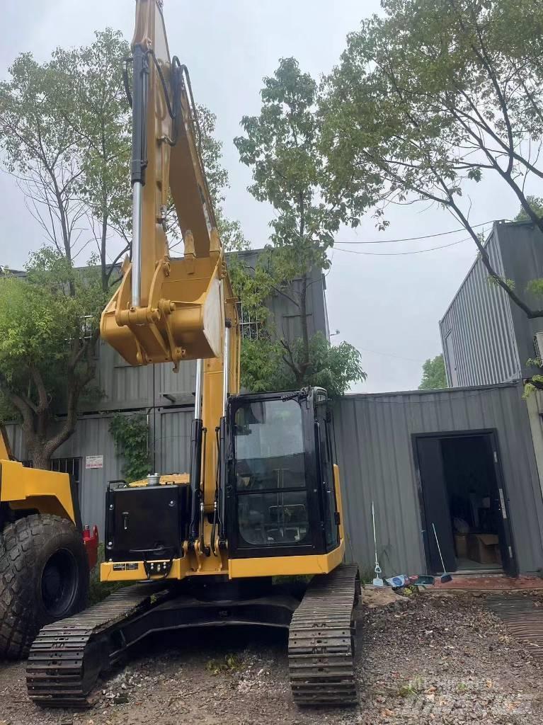 CAT 310 Roomikekskavaatorid