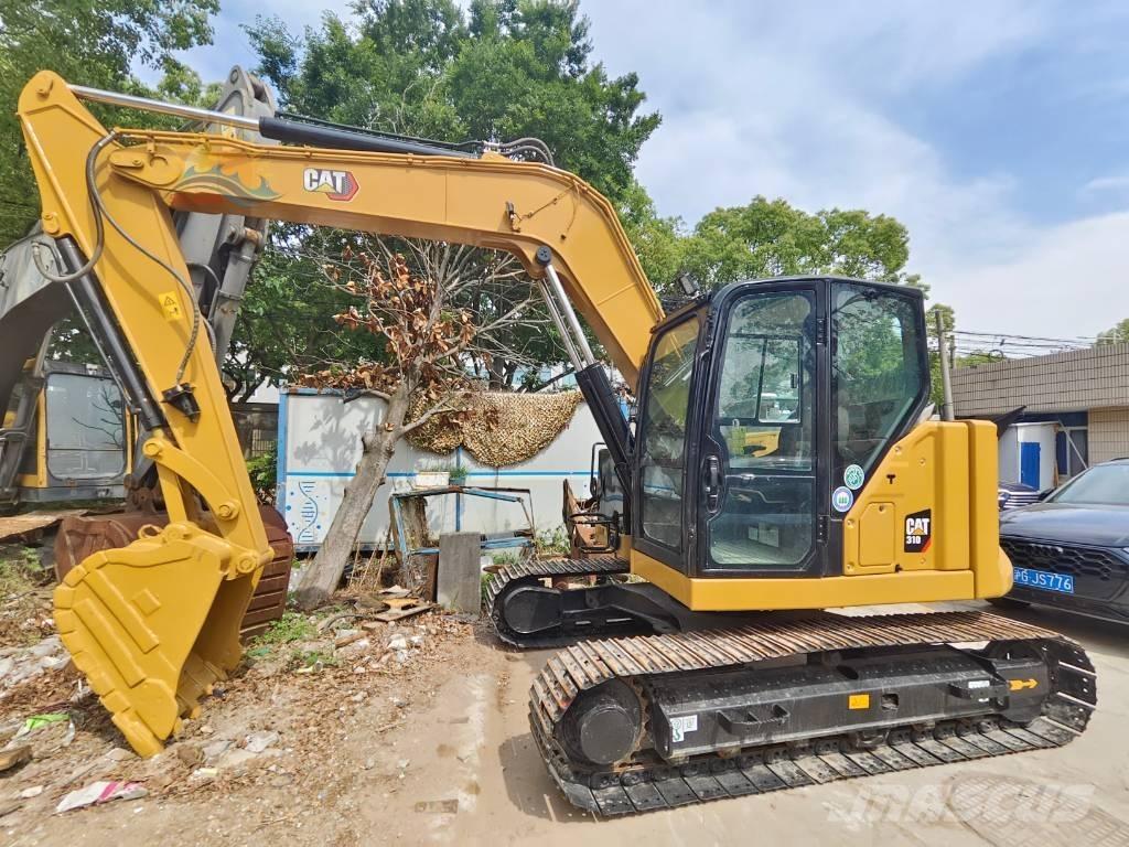 CAT 310 Roomikekskavaatorid
