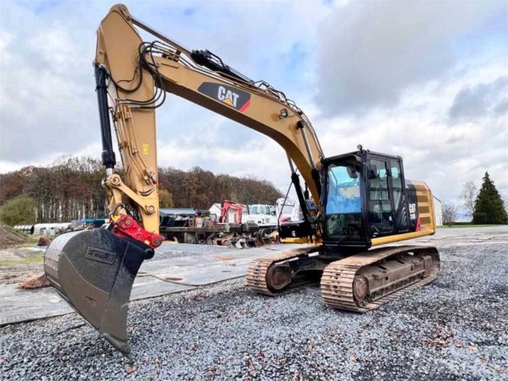 CAT 318EL + HS21 Roomikekskavaatorid