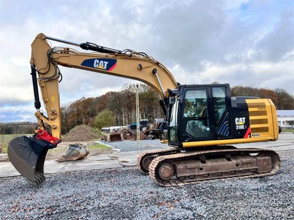 CAT 318EL + HS21 Roomikekskavaatorid