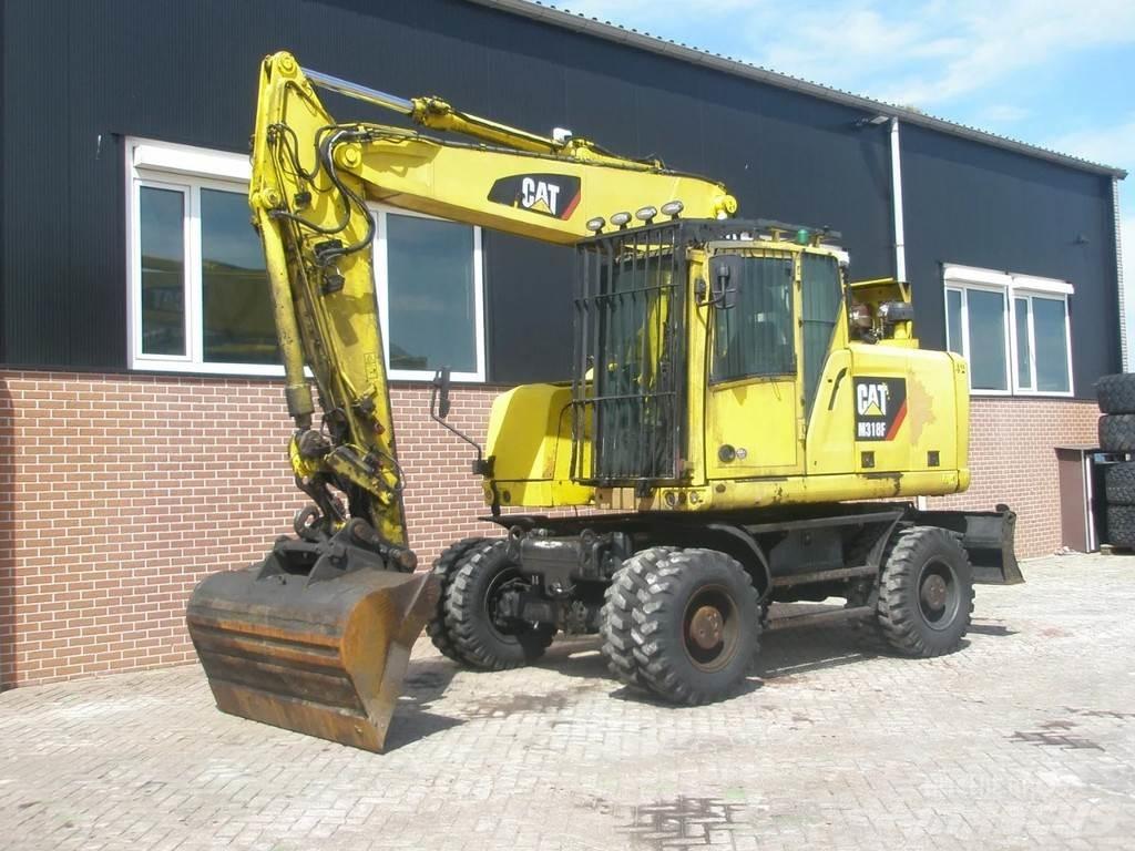 CAT M318F Ratasekskavaatorid