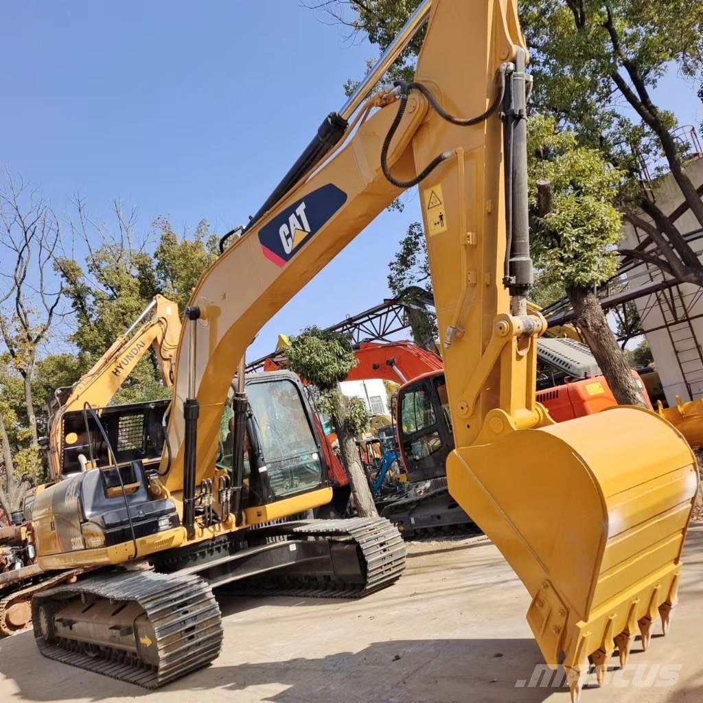 CAT 320 D L Roomikekskavaatorid