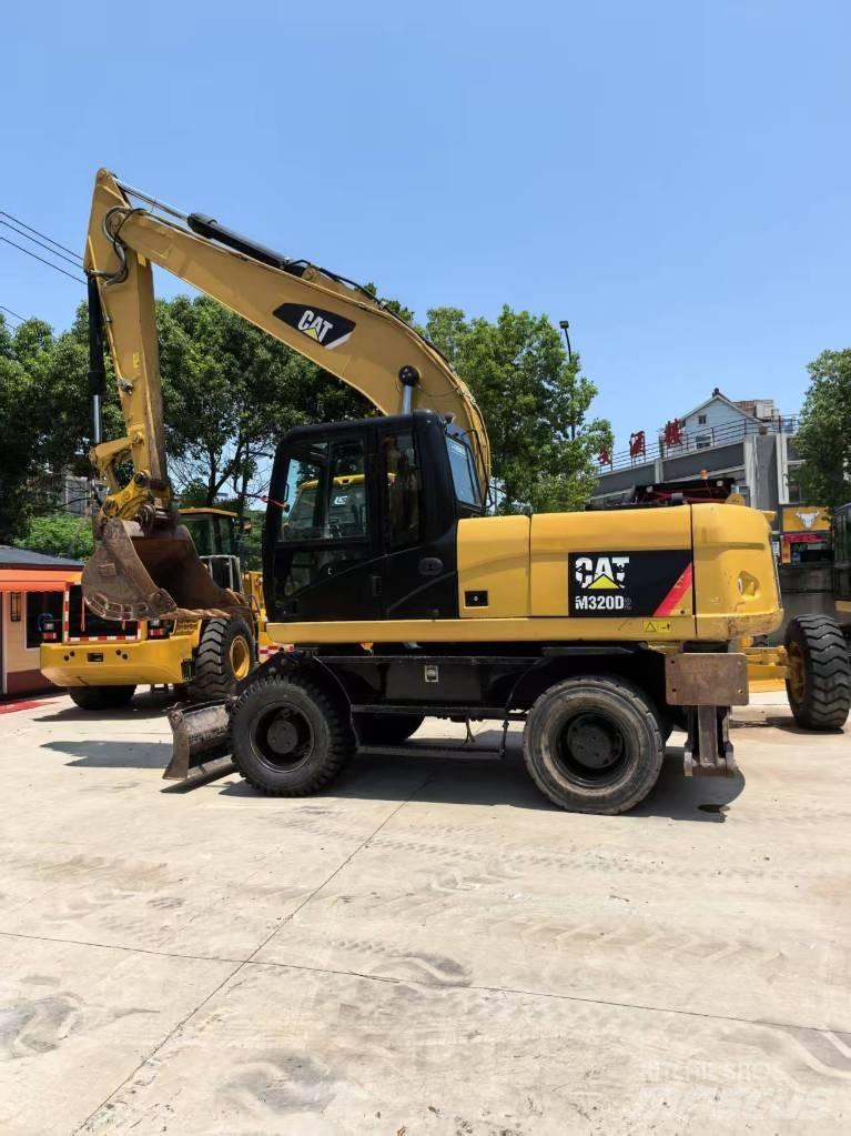 CAT M 320 Ratasekskavaatorid