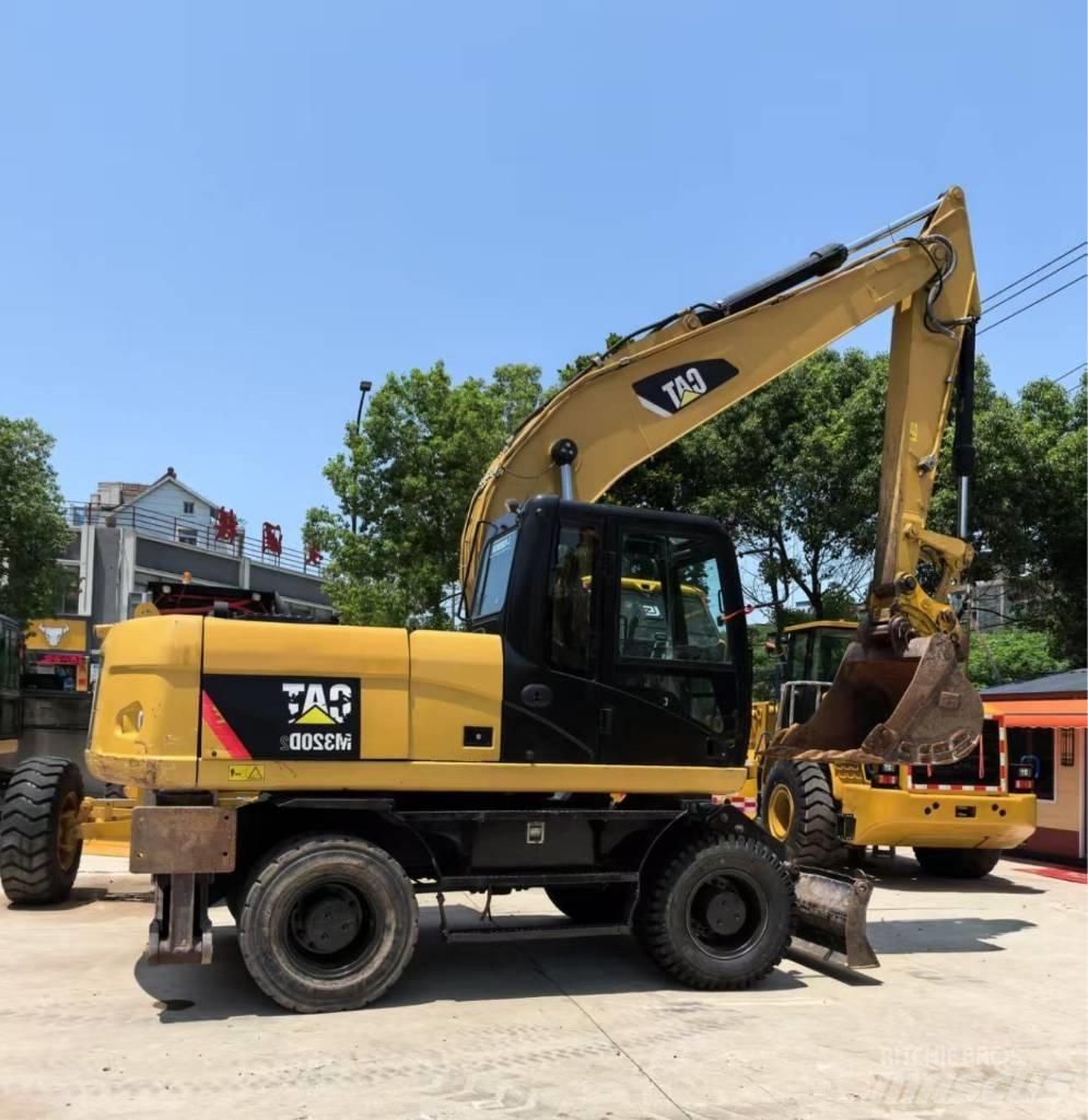 CAT M 320 Ratasekskavaatorid