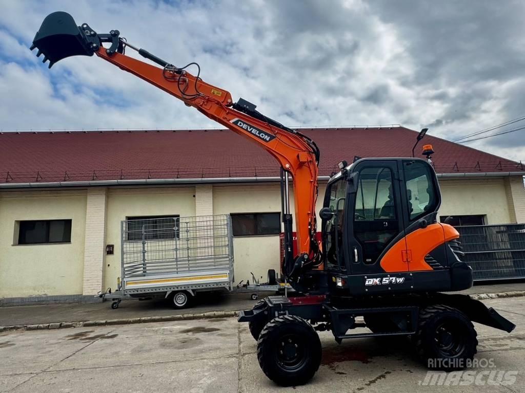 Develon DX 57 W-7 Ratasekskavaatorid