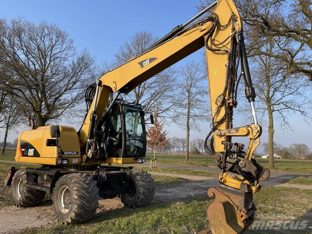 CAT M 313 D Ratasekskavaatorid