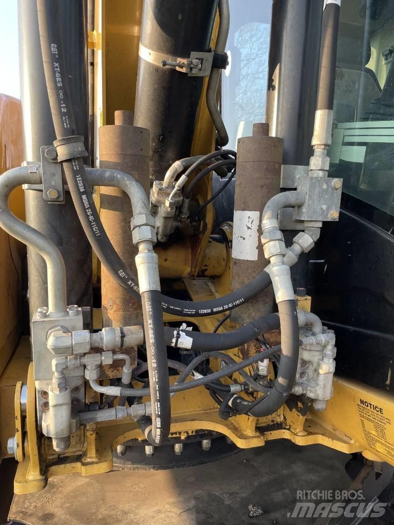 CAT M 313 D Ratasekskavaatorid