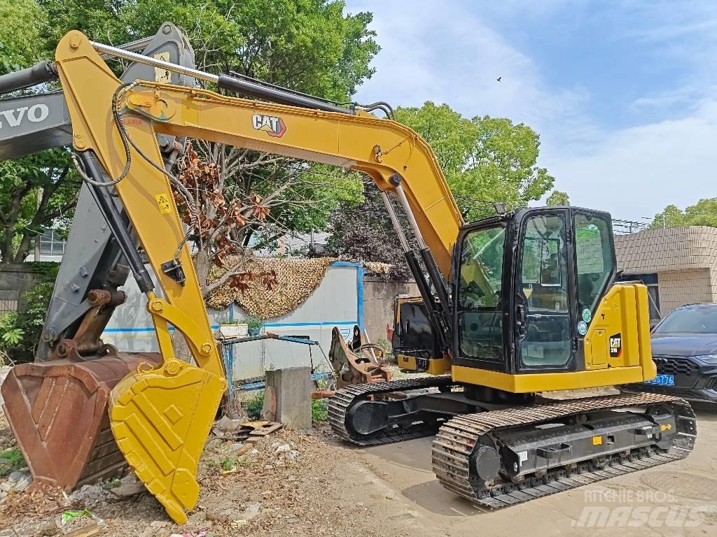 CAT 310 Roomikekskavaatorid