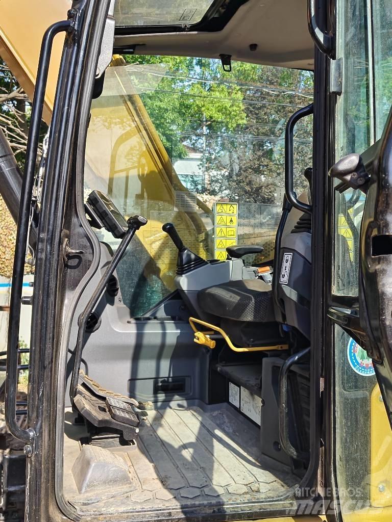 CAT 310 Roomikekskavaatorid