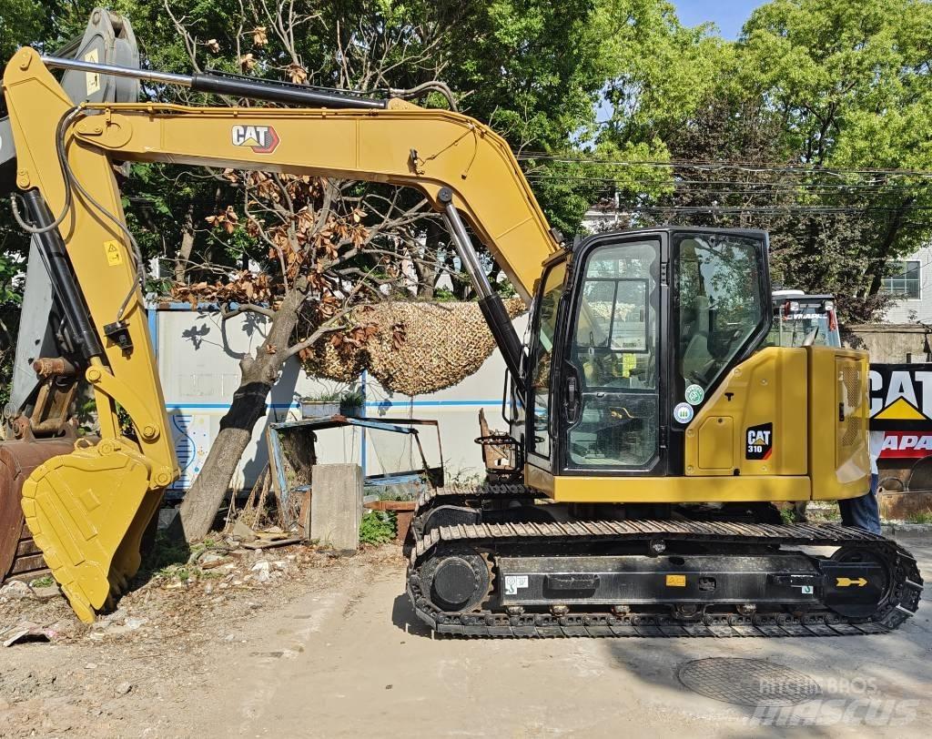CAT 310 Roomikekskavaatorid