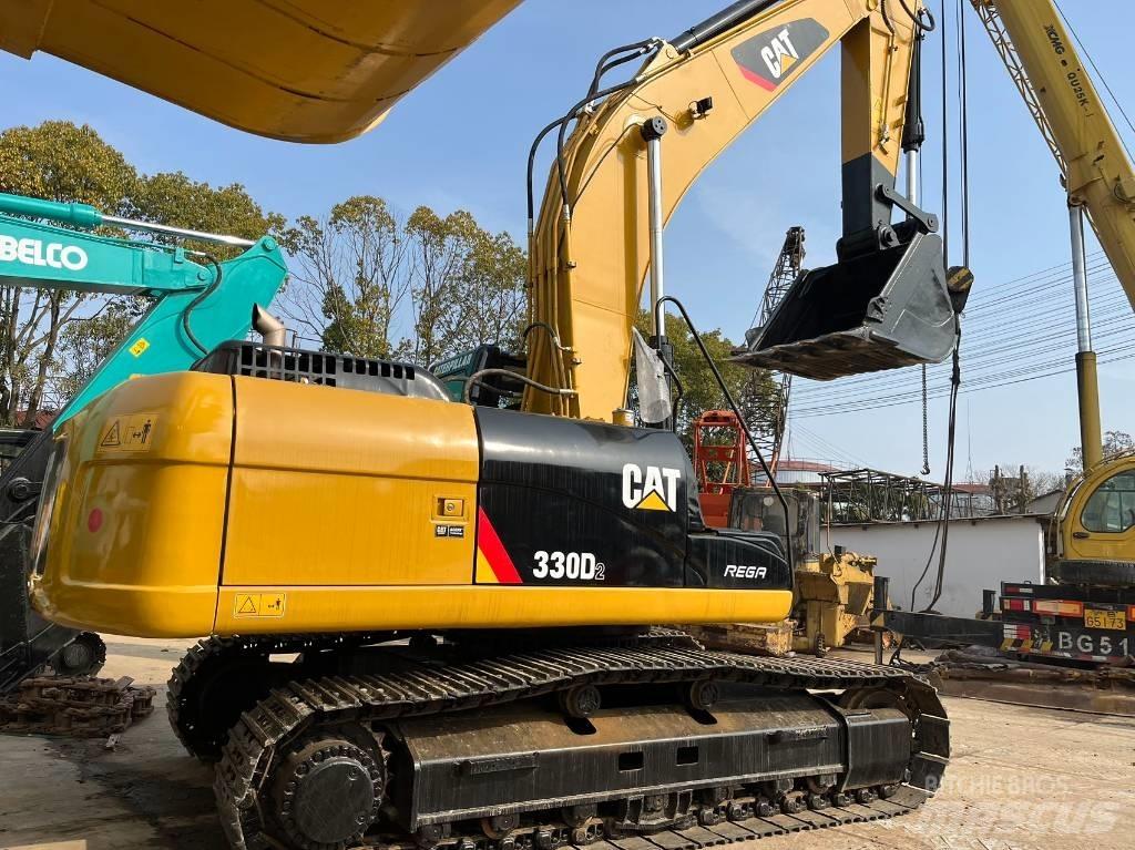 CAT 330 D L Roomikekskavaatorid