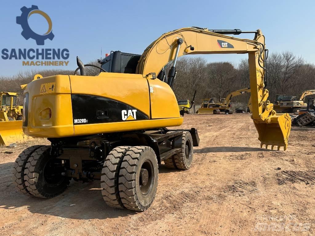 CAT M 320 D2 Ratasekskavaatorid
