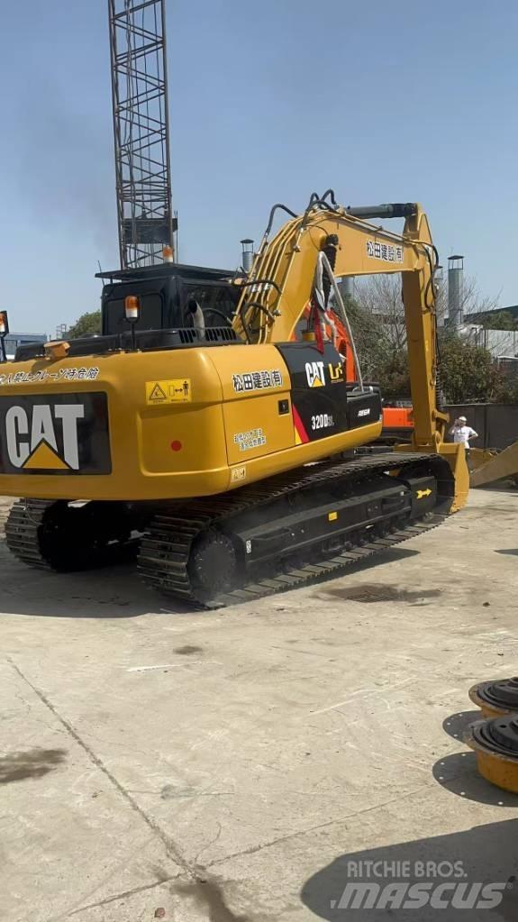 CAT 320 D L Roomikekskavaatorid