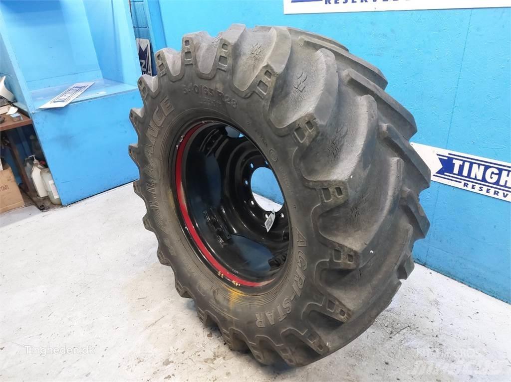  28 540/65-R28 Rehvid, rattad ja veljed