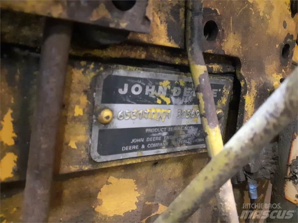 John Deere 644B Mootorid