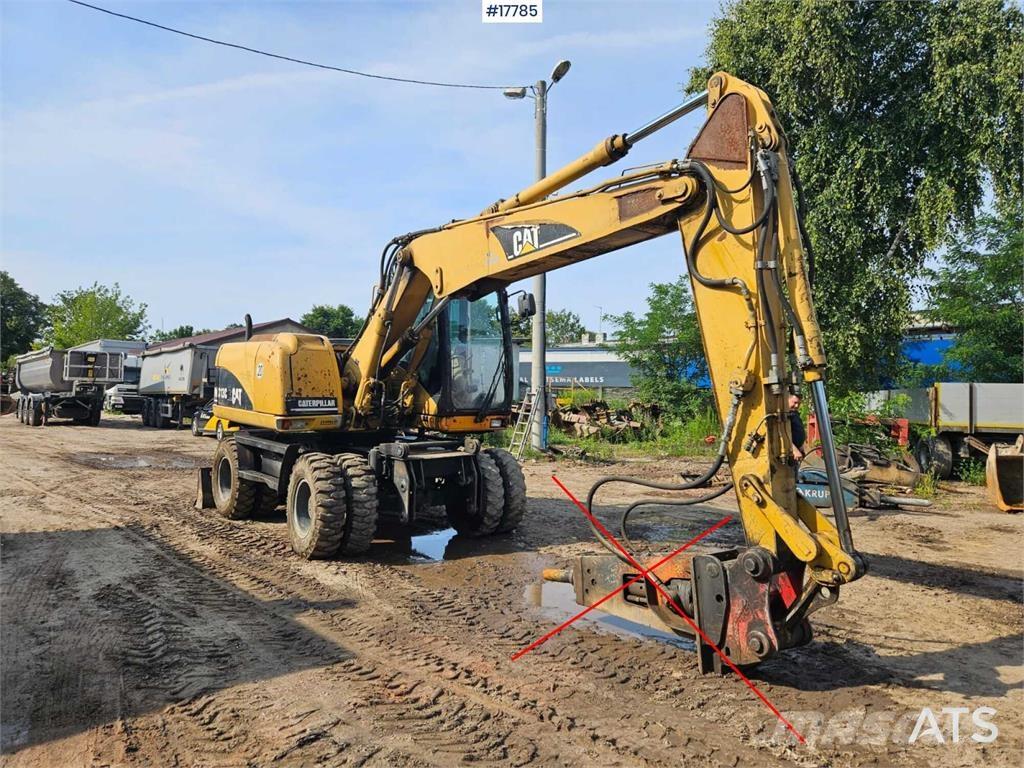 CAT M313 C Ratasekskavaatorid