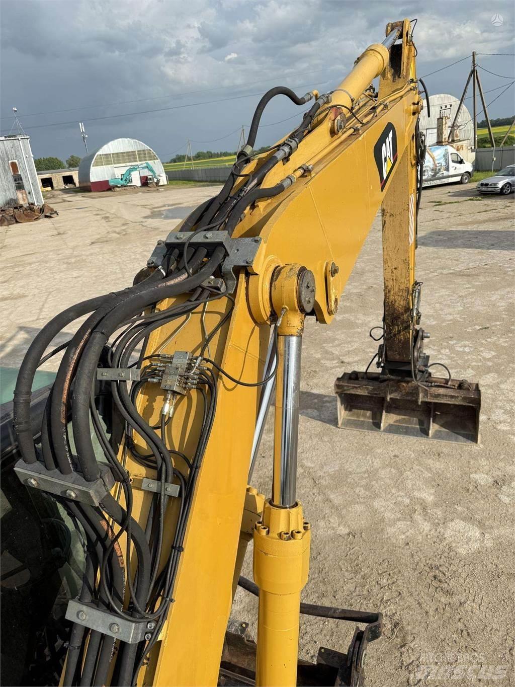 CAT M315C Ratasekskavaatorid