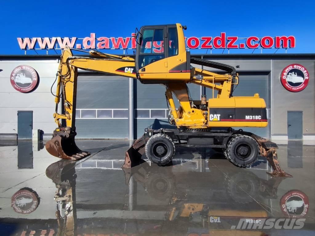 CAT M 318 C Ratasekskavaatorid