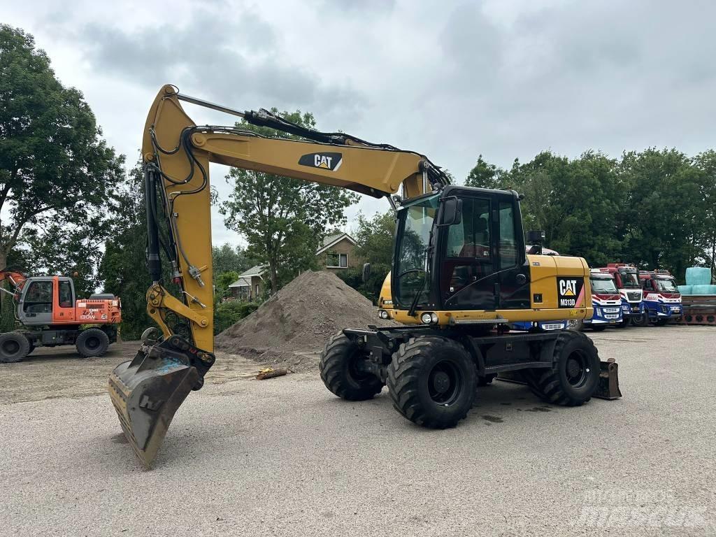 CAT M 313 D Ratasekskavaatorid