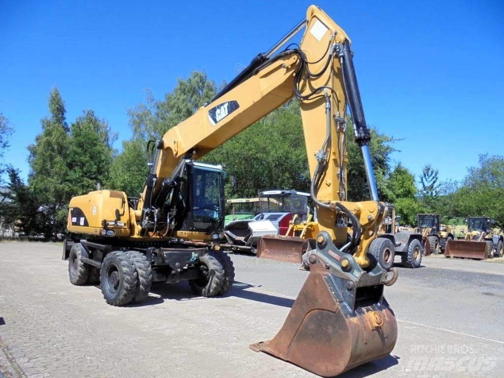 CAT M 322 D Ratasekskavaatorid