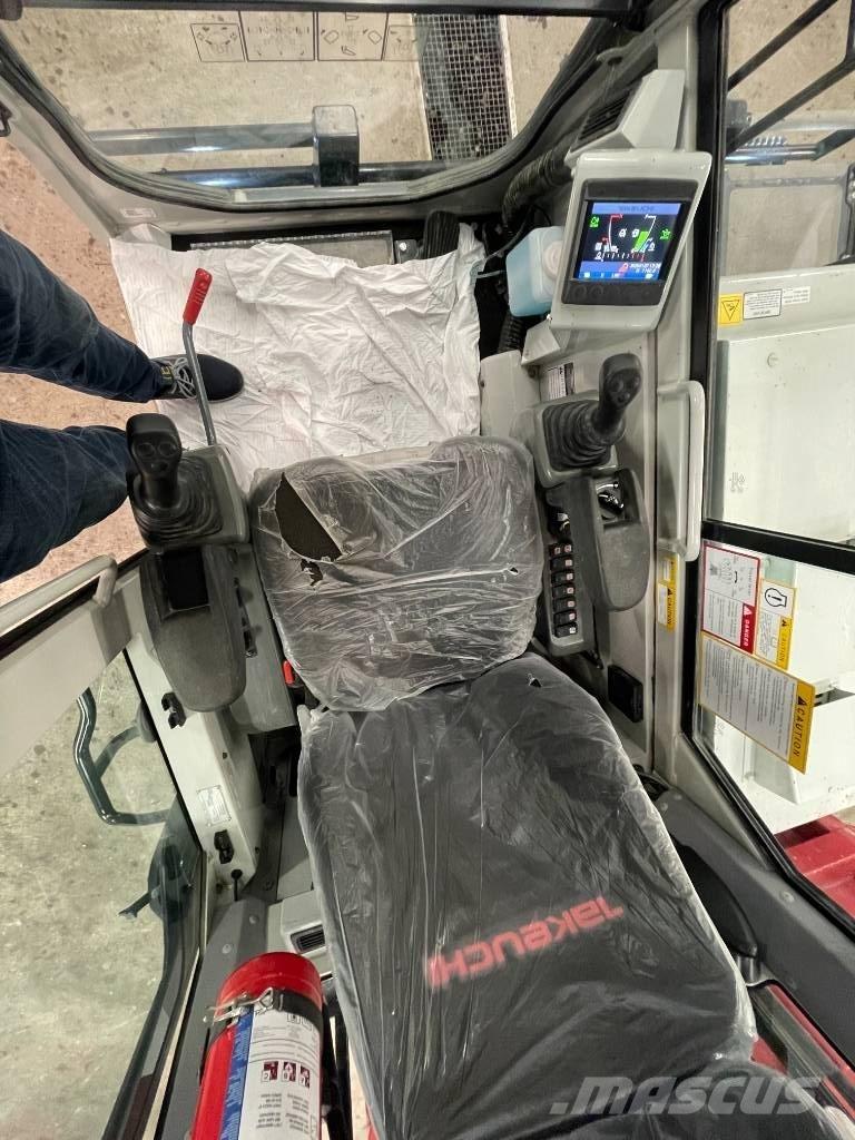 Takeuchi TCR 50 Roomikkallurid